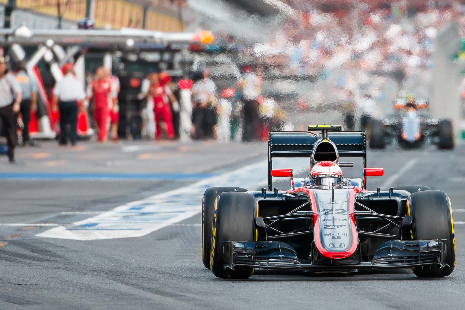 Formula One: March 14, 2015: Jenson Button (GBR) #22 from the McLaren Honda team leaves the pits for qualification at the 2015 Australian Formula One Grand Prix at Albert Park, Melbourne, Australia. Photo Sydney Low