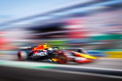 Sergio Perez (MEX) driving the (11) Red Bull Racing-Honda RBPT RB19 heads out onto pitlane to take his place on the grid for the start of the 2023 Formula 1 Rolex Australian Grand Prix in Melbourne, Australia.