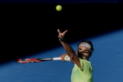 MELBOURNE – January 21, 2015: Roger Federer (SUI) in action in a 2nd round match against Simone Bolelli (ITA) on day three of the 2015 Australian Open grand slam tennis tournament at Melbourne Park in Melbourne, Australia. Federer won 3-6 6-3 6-2 6-2