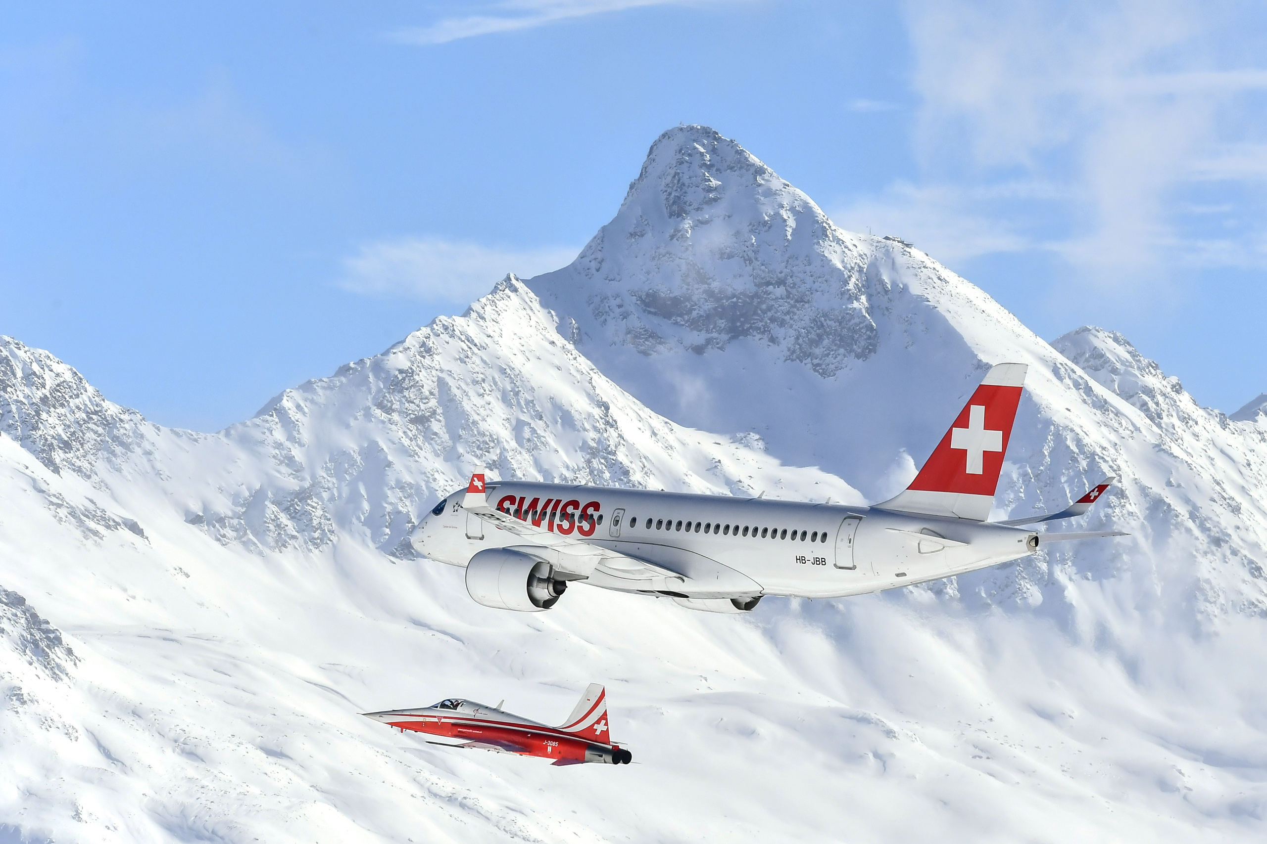 ST MORITZ - February 7, 2017: The Swiss Air's new Bombardier C Series and the Swiss Air Force’s air display team Patrouille Suisse put on a pre-race airshow at the FIS Alpine Ski World Championships. 20170211_SLB_5740